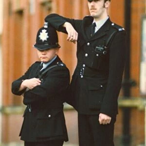 Little and large - these two police officers make a strange sight on the beat
