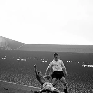 Liverpool 4 v. Fulham 3 Jimmy Hill is beaten to the ball by Saunders of Liverpool