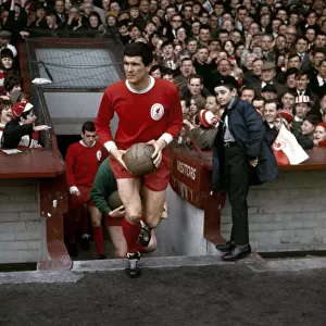 Liverpool captain Ron Yeats leads his team out for the English League Division One match