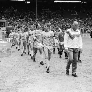 Liverpool coach Ronnie Moran walks out on to the pitch at Wembley as he leads his side Liverpool coach Ronnie Moran walks out on to the pitch at Wembley as he leads his side