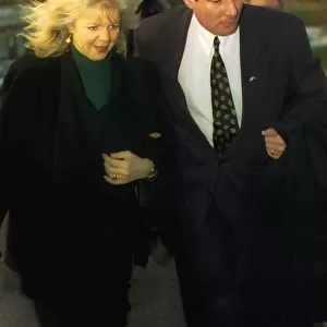 Former Liverpool Councillor Derek Hatton with his wife Shirley at Mold Crown Court for a