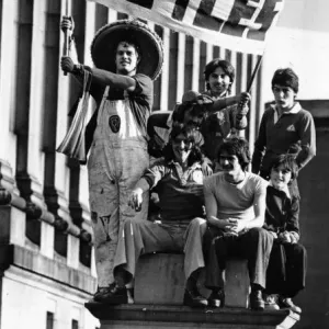 Liverpool fans carrying a Paisleys Apostles'banner as they gather with