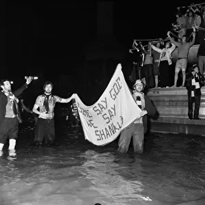 Liverpool fans in the fountains of Trafalgar Square after their win at Wembley in April
