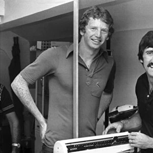 Liverpool FC player David Fairclough is weighed by David Johnson during his medical