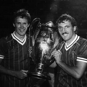 Liverpool FC players Phil Neal and Alan Kennedy with the European Cup