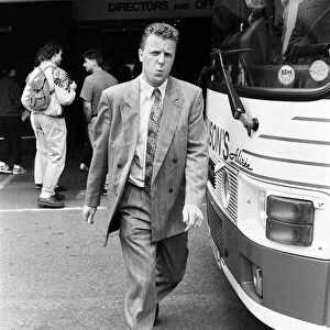 Liverpool football player Steve Nicol boards the team coach for their away match at