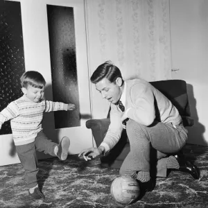 Print of Gordon Milne coaching his son Andrew at home in Maghull, 1966