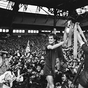 Liverpool Football team celebrate winning the League title after defeating Aston Villa