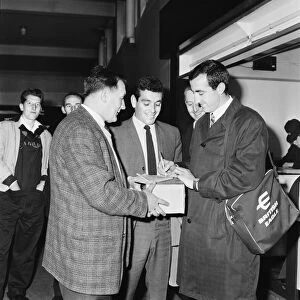 Liverpool footballer with Bob Paisley and Ian Callaghan at Ringway Airport