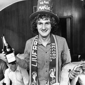 Liverpool footballer Phil Thomspon wearing top hart and club scarf Liverpool footballer Phil Thomspon wearing top hart and club scarf