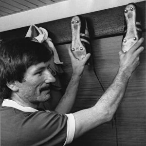 Liverpool footballer Tommy Smith in the dressing room at Anfield for his testimonial