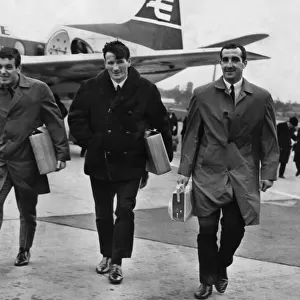 Liverpool footballers Ian Callaghan, Tommy Smith and Gerry Byrne arrive at Speke Airport