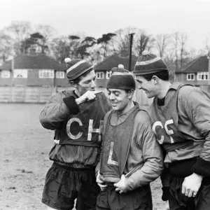 Liverpool footballers Willie Stevenson, Ian St John and Ron Yeats all wearing their Liverpool footballers Willie Stevenson, Ian St John and Ron Yeats all wearing their