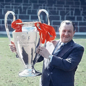 Liverpool manager Bob Paisley poses with the European Cup trophy at Anfield
