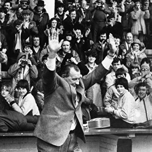 Liverpool manager Bob Paisley takes the salute of the crowd the pitch at Anfield as he