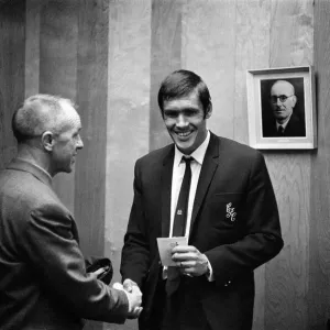 Liverpool manager Bill Shankly gives a farewell handshake to centre forward Tony Hateley