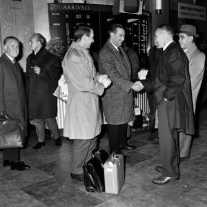 Liverpool manager Bill Shankly greets officials from the Belgian team Anderlecht as they