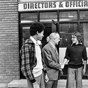 Liverpool manager Bill Shankly greets young fans outside the director