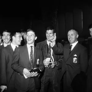 Liverpool manager Bill Shankly has a joke with his players at Ringway airport
