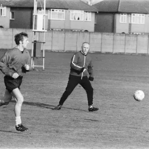 Liverpool manager Bill Shankly keeps a close eye on Liverpool forward Peter Thompson as Liverpool manager Bill Shankly keeps a close eye on Liverpool forward Peter Thompson as