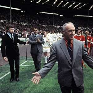 Liverpool manager Bill Shankly leads out his team on to the pitch at Wembley Stadium for