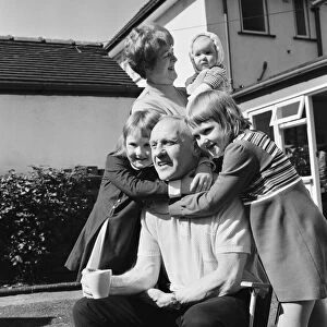 Liverpool manager Bill Shankly pictured relaxing at home with family
