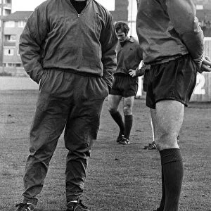 Liverpool manager Bill Shankly talking with John Toshack during a team training session