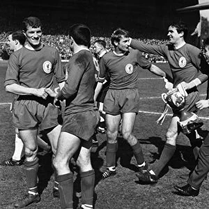 Liverpool players celebrate their title win following the 2-1 victory over Chelsea at