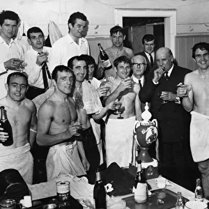 Liverpool players celebrate winning the league championship following their 2-1 victory