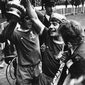 Liverpool players Kevin and Keegan celebrate with the FA Cup trophy following their 3-0 Liverpool players Kevin and Keegan celebrate with the FA Cup trophy following their 3-0