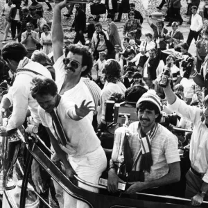 Liverpool players proudly show off the European Cup trophy to thousands of fans who lined Liverpool players proudly show off the European Cup trophy to thousands of fans who lined