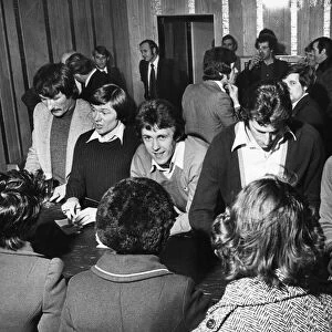 Liverpool players Tommy Smith, Brian Hall, Jimmy Case and Ray Clemence sign autographs