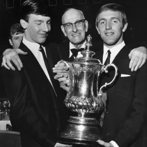 Liverpool President Mr T V Williams poses with Liverpool player Peter Thompson
