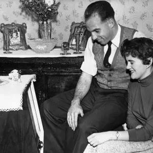 Liverpool full back Ronnie Moran with his girlfriend Joyce watching television at home Liverpool full back Ronnie Moran with his girlfriend Joyce watching television at home