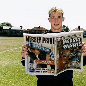 Liverpool striker Robbie Fowler with Mersey Giants Soccer Special. 10th August 1995