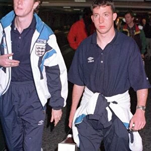 Liverpool teammates Steve McManaman (left) and Robbie Fowler arrive back at Heathrow