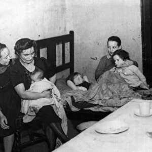 Liverpool Terrace Slum A mother and her family seen here living in one room of a