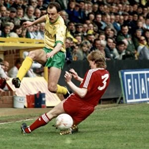 Liverpool v. Norwich City Steve Staunton tackling Michael Phelan