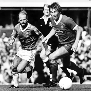 Liverpools Kenny Dalglish shadowed by fellow Scot Archie Gemmill during their