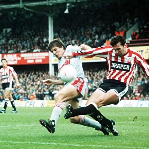Liverpools Peter Beardsley challenges Neil Ruddock of Southampton for the ball