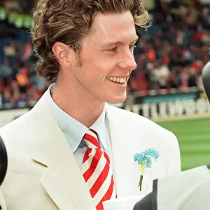 Liverpools Steve McManaman on the pitch at Wembley being interviewd by the BBC