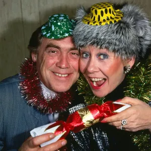 Liz Dawn and Bill Tarmey pulling a Christmas cracker December 1987 Liz Dawn and Bill Tarmey pulling a Christmas cracker December 1987