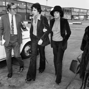 Liza Minnelli and Desi Arnaz Jnr stepped arm-in-arm from a jumbo jet at Heathrow Airport