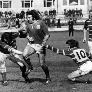 Llaneli forward Tommy David looks quite capable of taking on half the Bridgend team in Llaneli forward Tommy David looks quite capable of taking on half the Bridgend team in