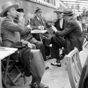 Local men chatting at an outdoor cafe in Seville, Andalusia Circa 1935