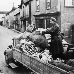 Local resident loads his possessions on to a lorry prior to evacuation Local resident loads his possessions on to a lorry prior to evacuation