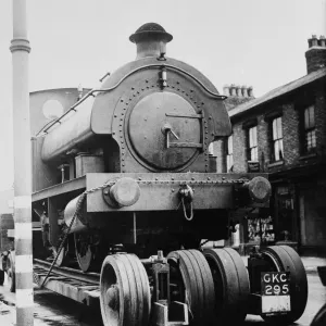 A locomotive train is drawn through the streets of Stretford on the way to the repair A locomotive train is drawn through the streets of Stretford on the way to the repair