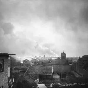 London docks burn as the Luftwaffe drop high explosives London docks burn as the Luftwaffe drop high explosives