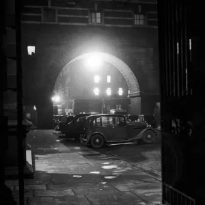 London by Night. View of motor cars parked outside Old Scotland Yard London by Night. View of motor cars parked outside Old Scotland Yard