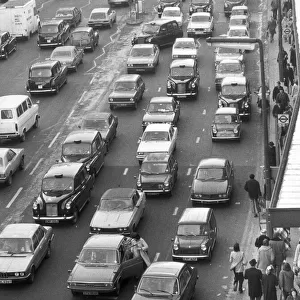 London traffic in Knightsbridge looking towards Hyde Park Corner. 6th January 1979